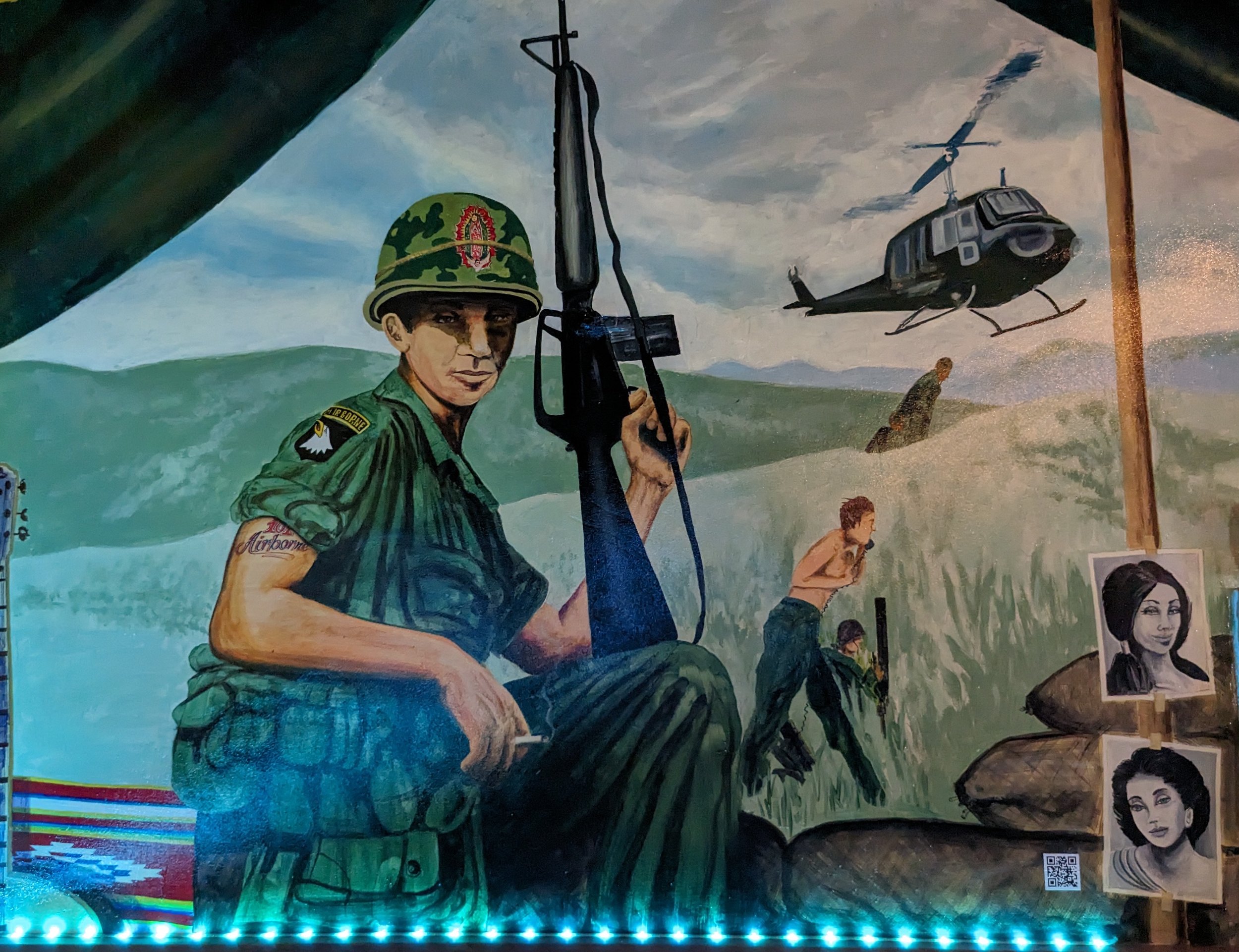 Mural of Hispanic veterans serving in the Vietnam War displayed inside El Portal Mexican Restaurant, Phoenix, Arizona. Artist Jose Andres Girlon.