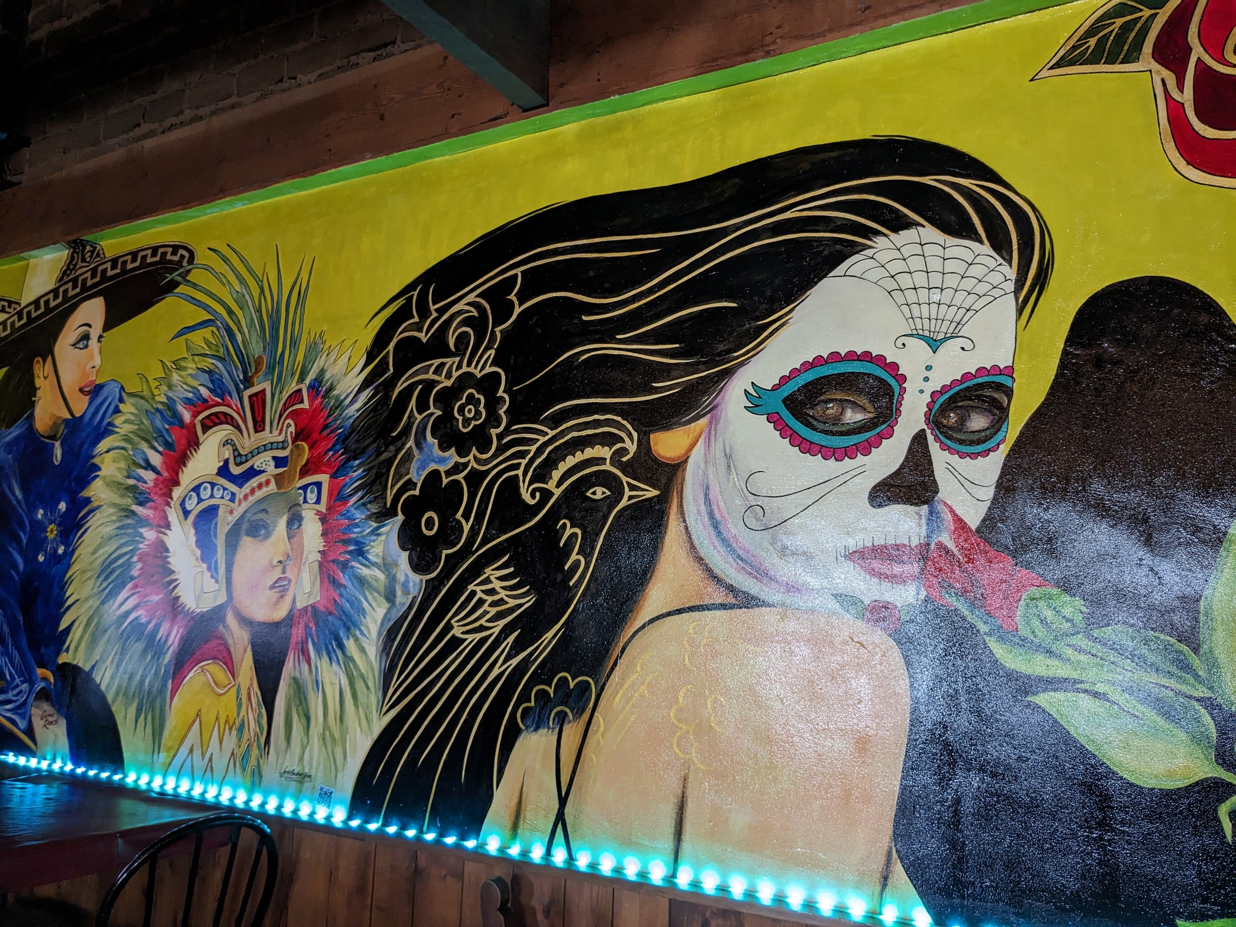 Mural of traditionally dressed Mexican women inside El Portal Mexican Restaurant, Phoenix, Arizona. Artist Jose Andres Giron.